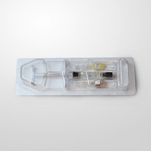 pack of syringe on grey background