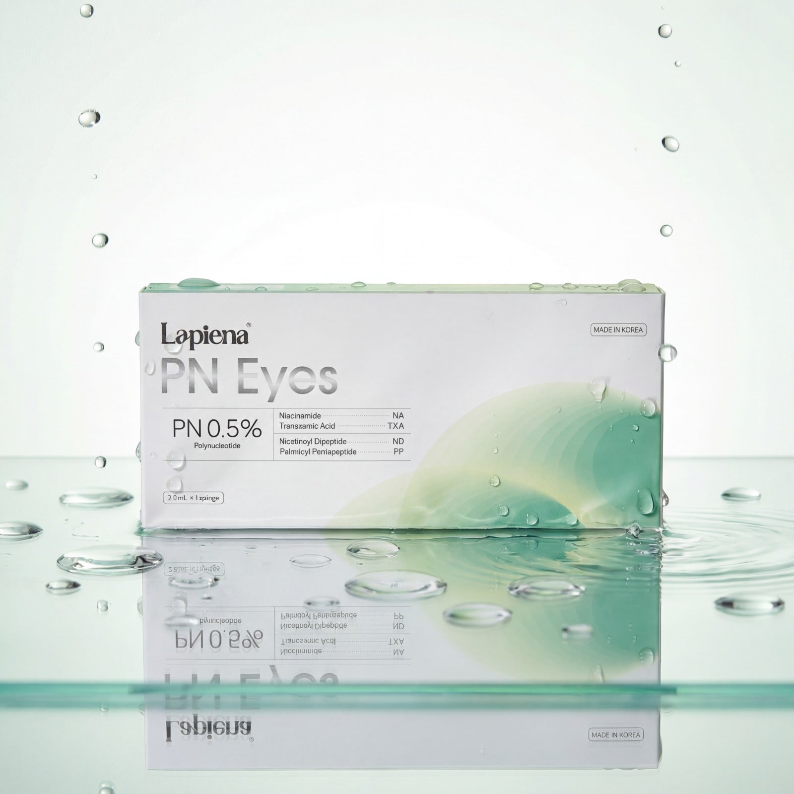Box of Lapiena PN Eyes eye booster on a reflective surface with water droplets