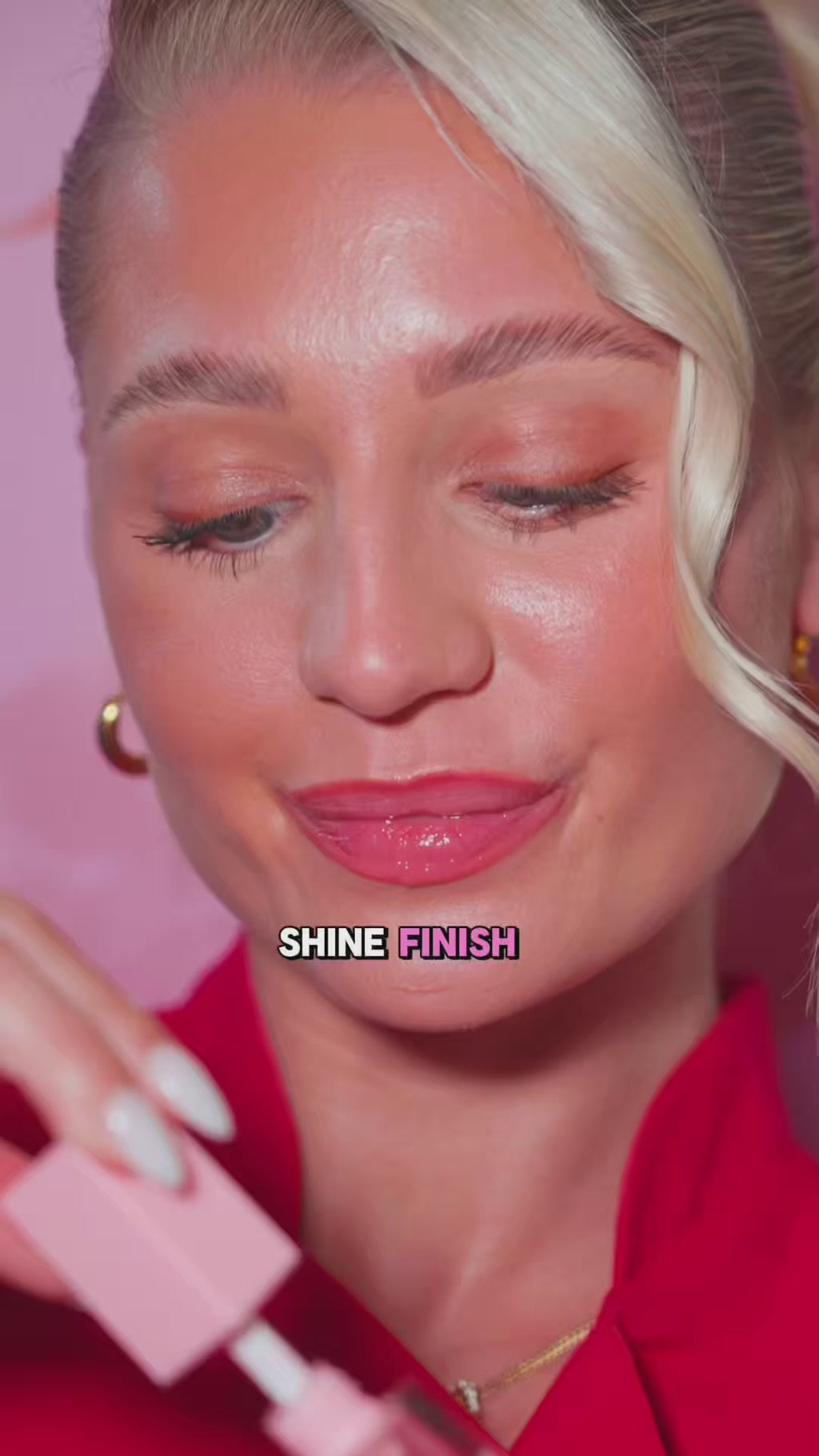 video of woman apply lip oil to her lips