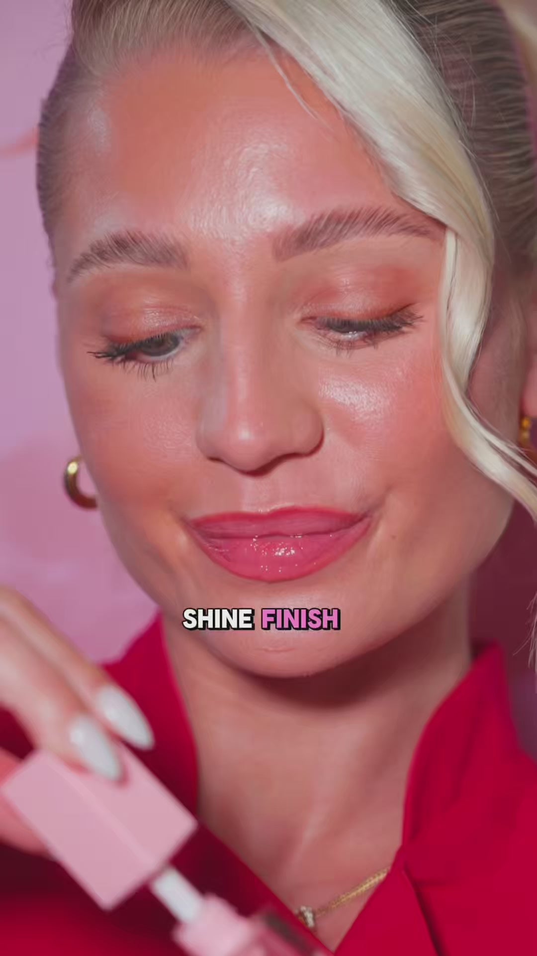 video of woman apply lip oil to her lips